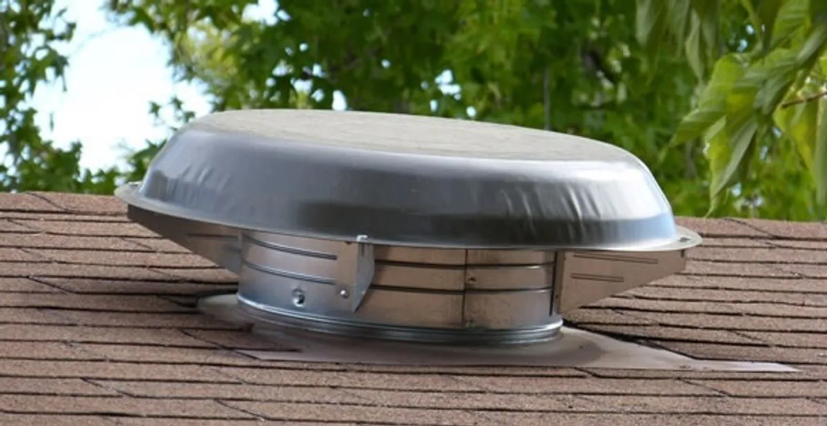 attic fan installation services with low-profile roof ventilation unit in Boise, ID