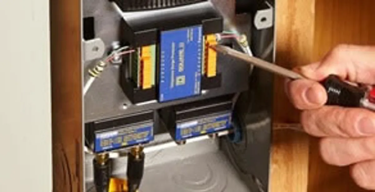 Whole home surge protection device being installed by a licensed electrician to protect electrical systems in Boise, ID